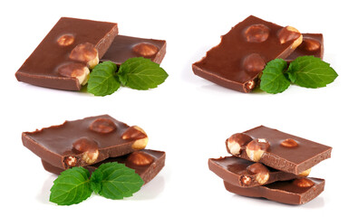 Chocolate with hazelnut and mint leaf isolated on white background. Set or collection