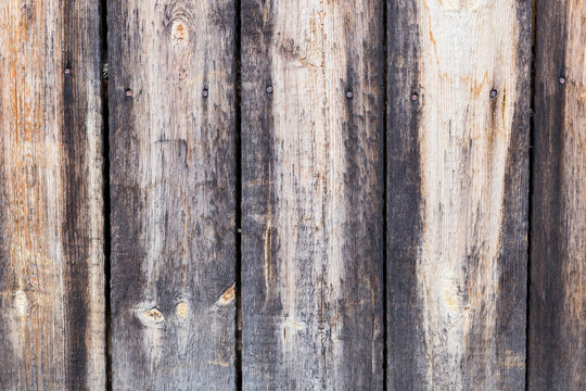 old wooden background with multicolored, brown, black and white