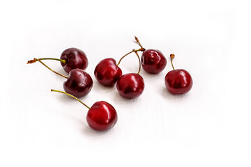 Obraz na płótnie Canvas Burgundy cherry on white background