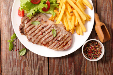 grilled beef steak and french fries