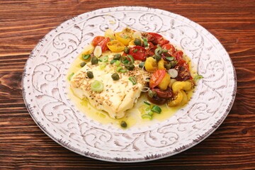 Baked feta cheese with cherry tomatoes