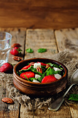 Strawberry spinach goat cheese pecan salad