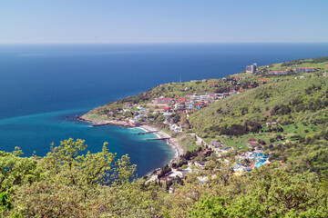 Fototapeta na wymiar Blue bay of Crimea, view from the mountain-cat on Black sea resort