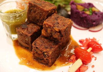 Deep fried crispy minced pork cubes with spicy chili sauce and mashed purple sweet potatoes  
