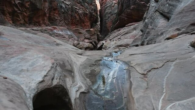 Echo Canyon Stream flows in slot canyon in Zion