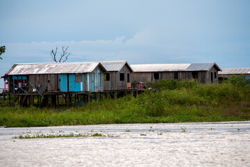 Fototapeta na wymiar Floating houses in amazon river - Manaus - Brazil
