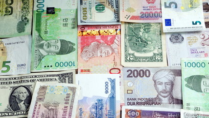 US dollars, Korean Won, Euro bills and some money bills and banknotes. Currency foreign exchange. Business and Financial or money management for investments.