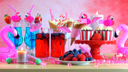 Summer party table with pink flamingo theme