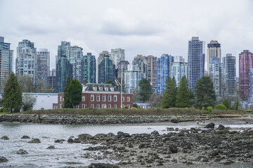 Fototapeta premium The skyline of Vancouver harbourfront - dramatic sky - VANCOUVER - CANADA - APRIL 12, 2017