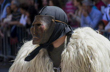 SASSARI, ITALY - May 21th, 2017 - Sardinian ride parade - Man dressed in Sardinian traditional costumes - Boes and Merdules "The Guardians of the Oxen", from Ottana.