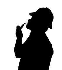Obraz na płótnie Canvas Silhouette of bearded man smoking pipe with Sherlock hat looking up
