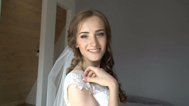 Beautiful bride on your wedding day in the room