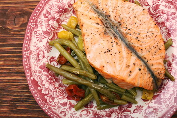 Salmon steak, veggies and herbs