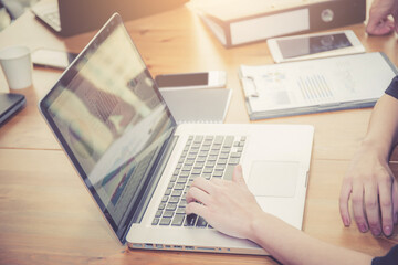 Obraz premium Closeup computer notebook in office with woman for work.