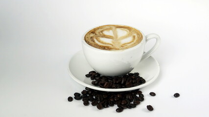 Hot cappuccino with streamed milk. Pour the hot latte art by milk. Aroma and flavor coffee beverage.