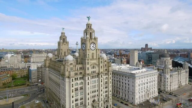 Rising Aerial View Of Liverpool Town Hall Cityscape with Historic Iconic Royal Liver Building Clock Tower in England UK 4K UHD