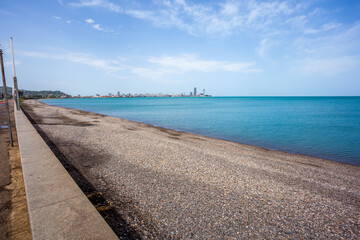 Fototapeta premium View Of Embankment Of The Georgian Resort Town Of Batumi. Modern Urban Architecture In The Early Morning. View From Sea. Batumi, Georgia, 14.05.2017