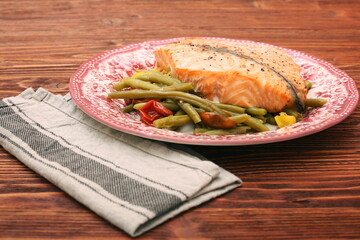 Salmon steak, veggies and herbs