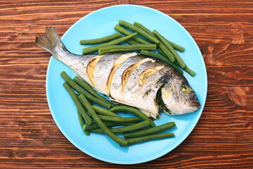 Grilled sea bream fish with green beans