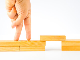 Finger walking on bridge over the gap between problem and solution, Business Solution concept.