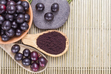 Fruits and acai powder originating from the Amazon  (Euterpe oleracea)