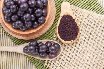 Fruits and acai powder originating from the Amazon  (Euterpe oleracea)