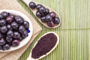 Fruits and acai powder originating from the Amazon  (Euterpe oleracea)