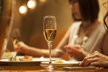 Women are eating at a restaurant