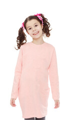 Beautiful little girl in a pink dress.