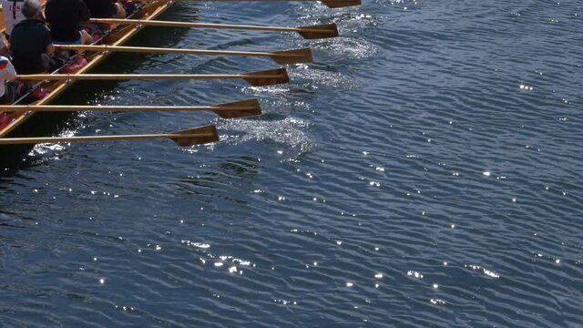 Rowers training in small canal