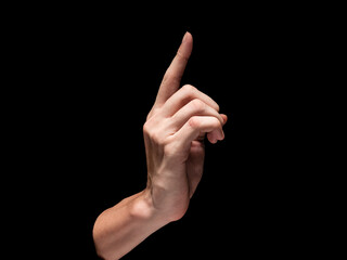 Male hand on a black background.