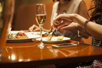 Women are eating dinner at a restaurant