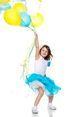 Fototapeta na wymiar Little girl with multicolored balloons.