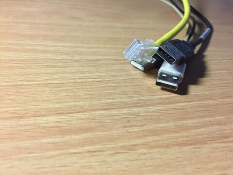 many cable on wood background