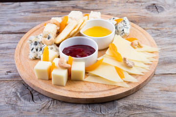 Cheese platter on wooden board