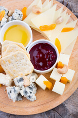 Cheese platter on wooden board