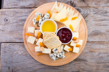 Cheese platter on wooden board