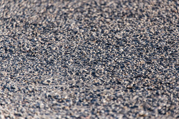 Old black asphalt as background