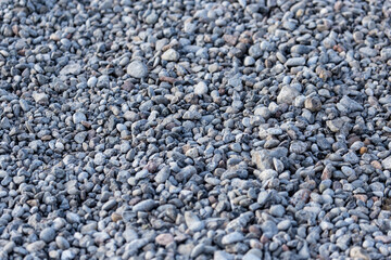 Crushed stone on the road as a background