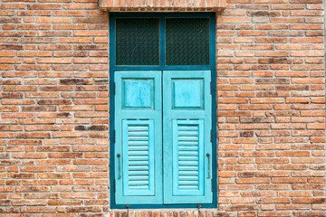 old wood window on brick wall