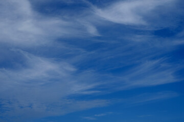 White fluffy clouds on the blue sky in Thailand.