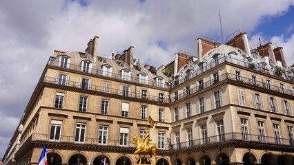 Fototapeta na wymiar Photo of golden statue of Jean d'Arc in Paris, France
