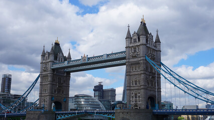 Fototapeta na wymiar Photo of tower bridge on a cloudy spring morning, London, United Kingdom