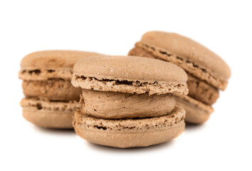 Three brown french macaroon cookies