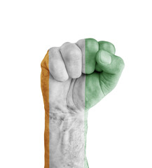 Flag of Cote d'lvoire painted on human fist like victory symbol