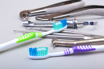 dental care toothbrush with dentist tools isolated on white background. Selective focus.