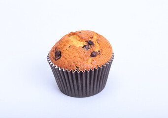 Fresh homemade muffins on white background. Top view.