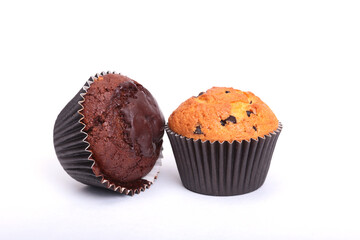 Fresh homemade muffins on white background. Top view.