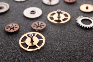Detail of watch machinery on the table.
