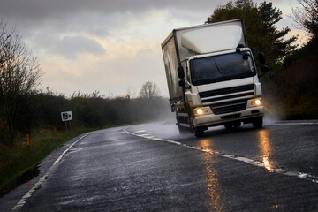 A truck transporting goods along the A1 motorway, England UK.